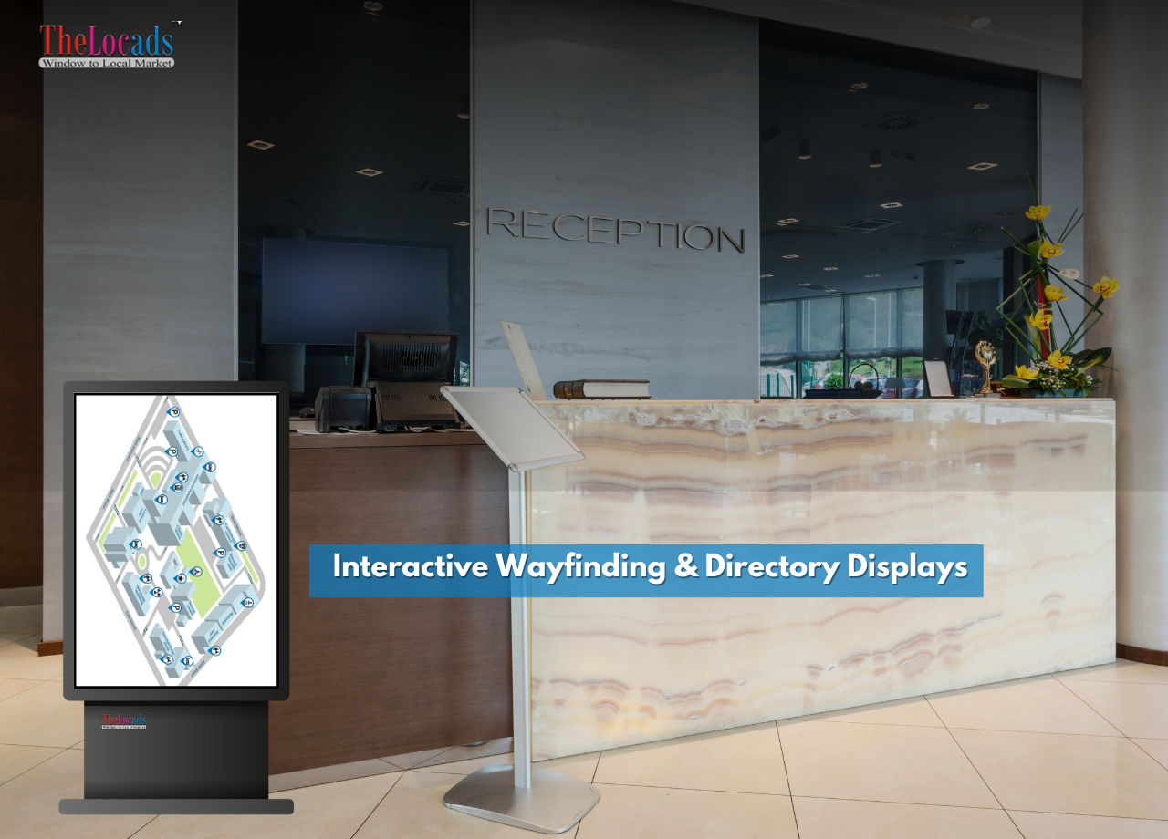 Digital wayfinding kiosk at a building reception showing an interactive map and directory for easy navigation.